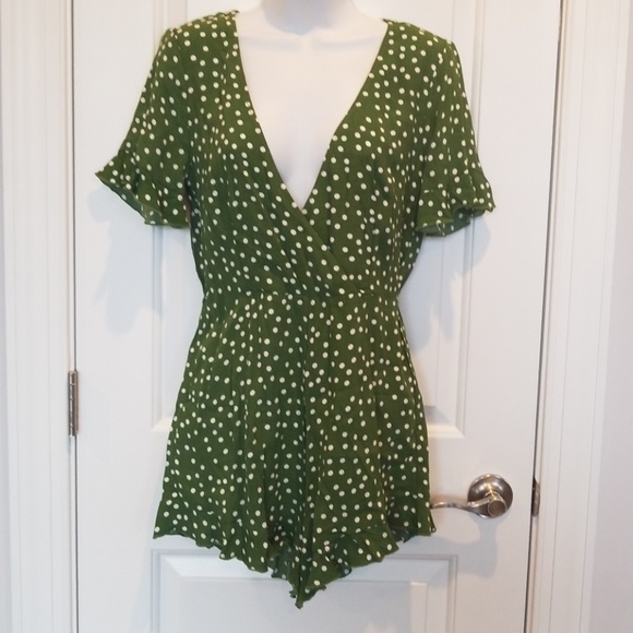 green and white polka dot jumpsuit